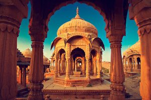 The royal cenotaphs, also known as Jaisalmer Chhatris, at Bada Bagh in Jaisalmer. Made of yellow sandstone at sunset